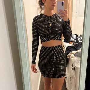 Black and gold sequin dress